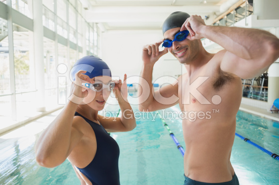 stock-photo-51547092-fit-couple-swimmers-by-pool-at-leisure-center